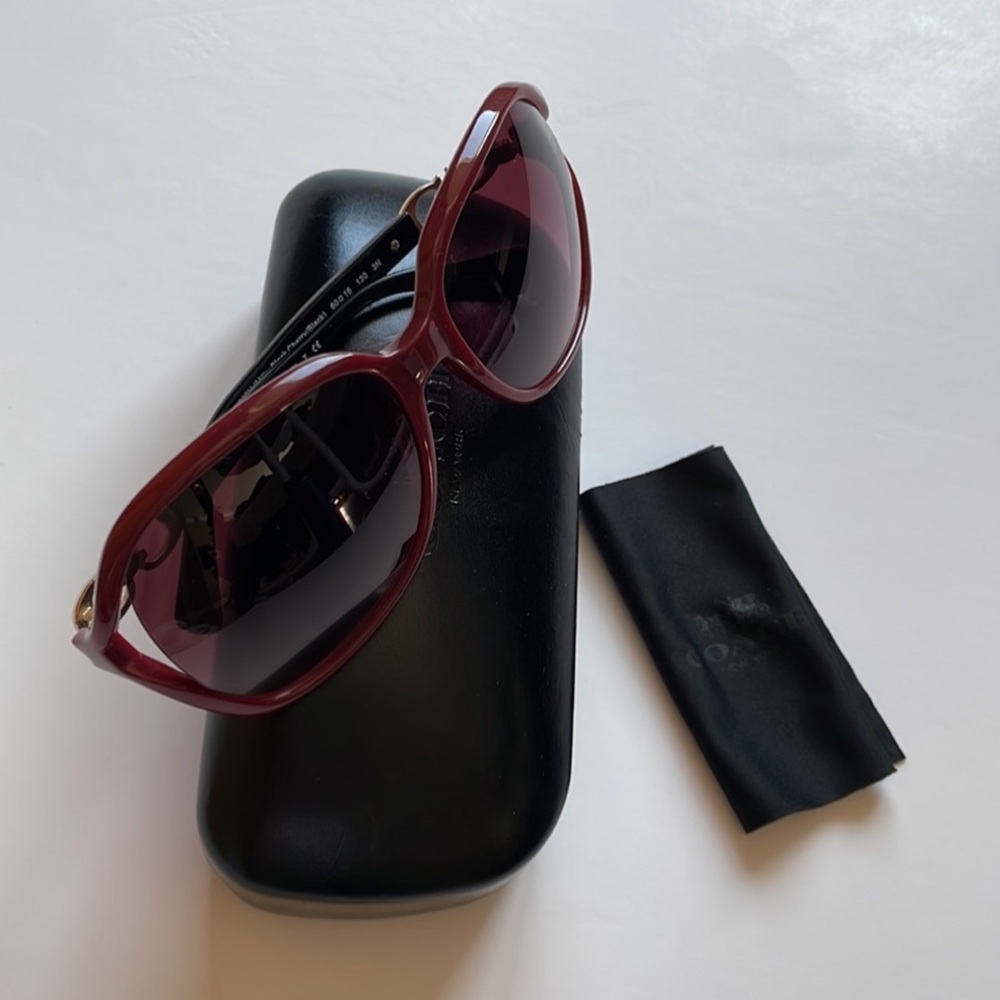 Used Coach HC8145 sunglasses color purple